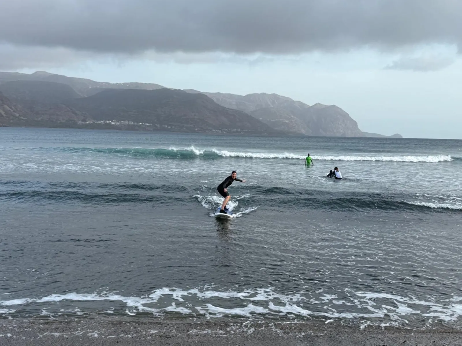Surfer catching a wave at Tarrafal